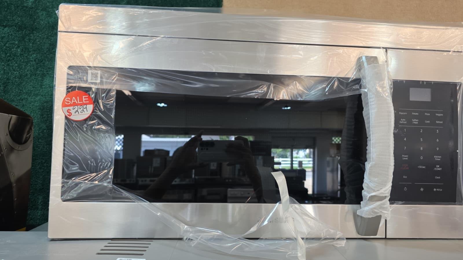 NEW STAINLESS MICROWAVE